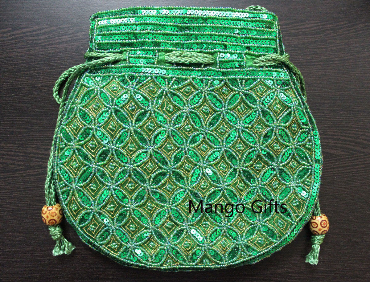 Beautiful handmade green potli bag with sequins, perfect for fashionable outings and carrying small essentials.